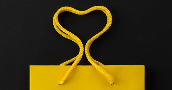 Yellow gift back isolated on a black background